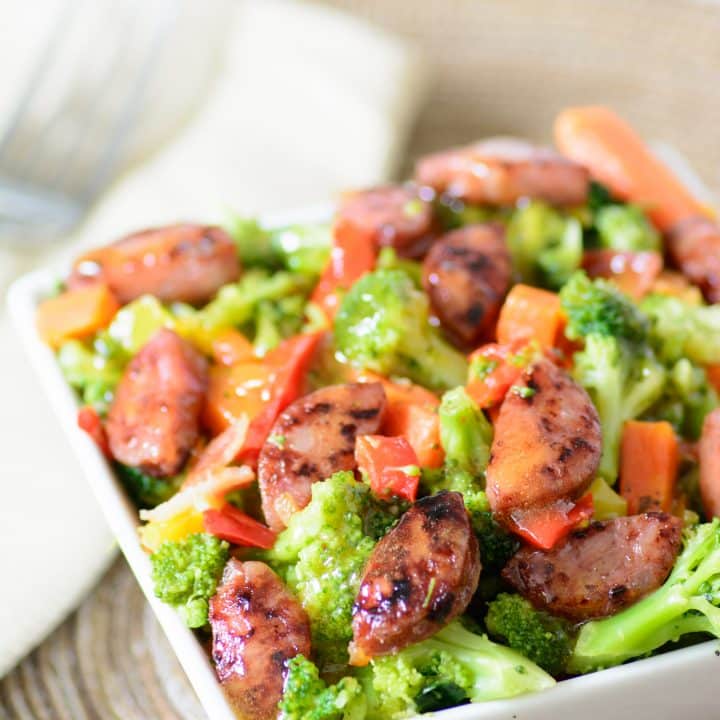 Sausage & Steamed Veggies with Pineapple Sriracha Sauce. This whole foods recipe gluten free and paleo, making it a delicious alternative to processed foods. You won't beleive how good this tastes.