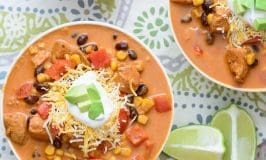 Cozy up with this tasty One Pot Baja Chicken Enchilada Soup! It's healthy, hearty, and full of robust flavor! If you only ever make one mexican soup recipe, it should be this one!